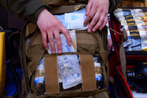 Medic packing backpack with supplies with lots of pockets