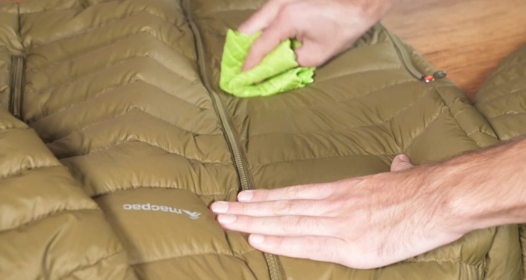 Prepping and or spot cleaning before turning down jacket inside out for washing